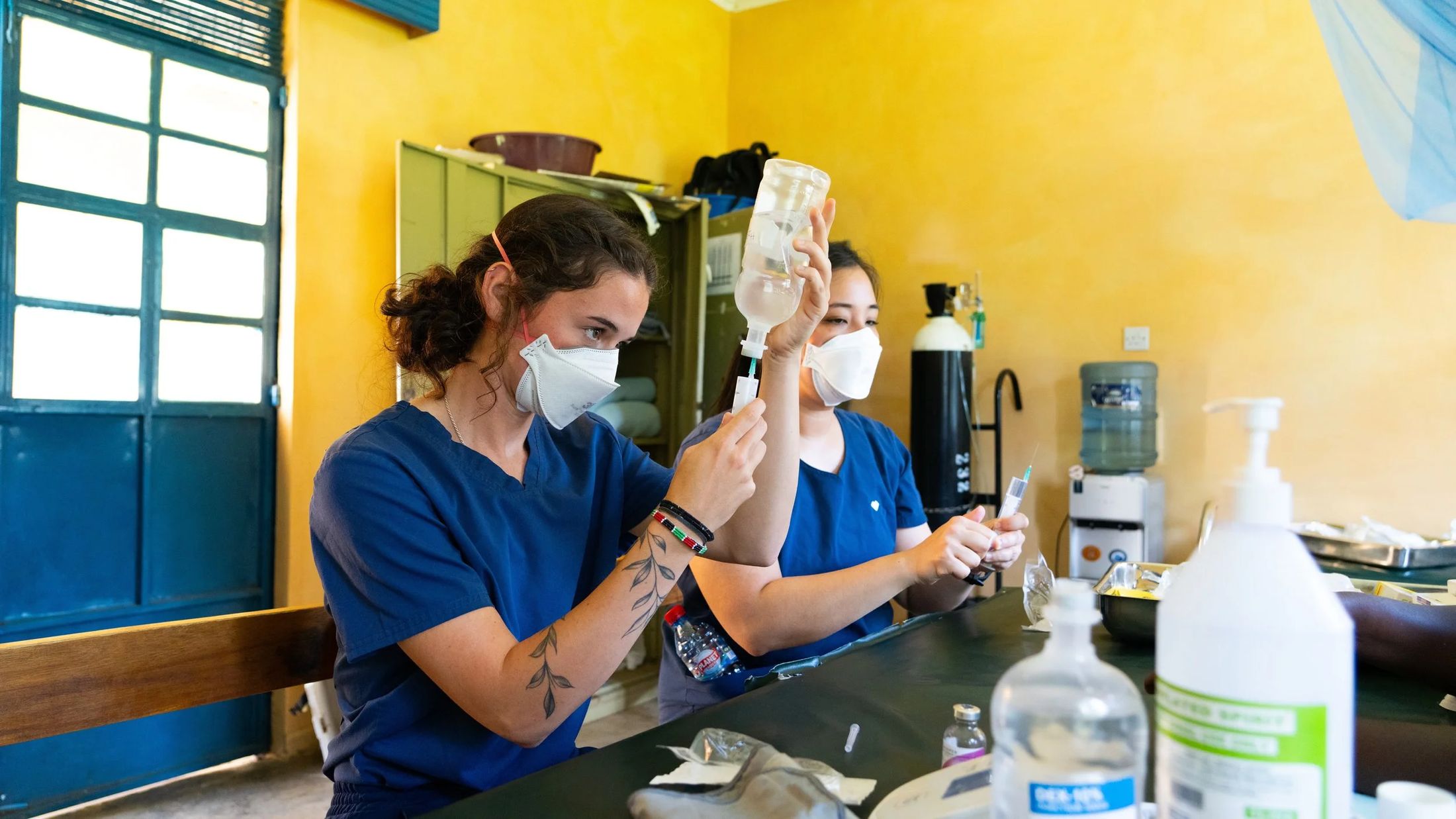 Nurses preparing vaccinations at a community clinic