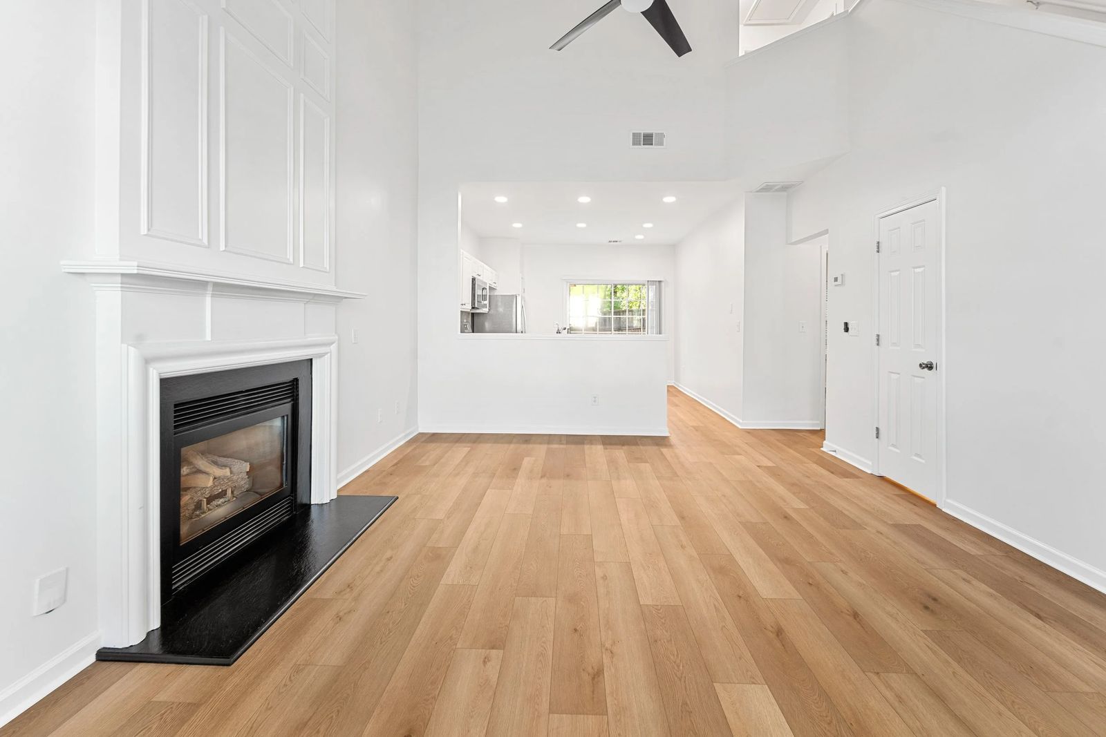 An open living room with a fireplace