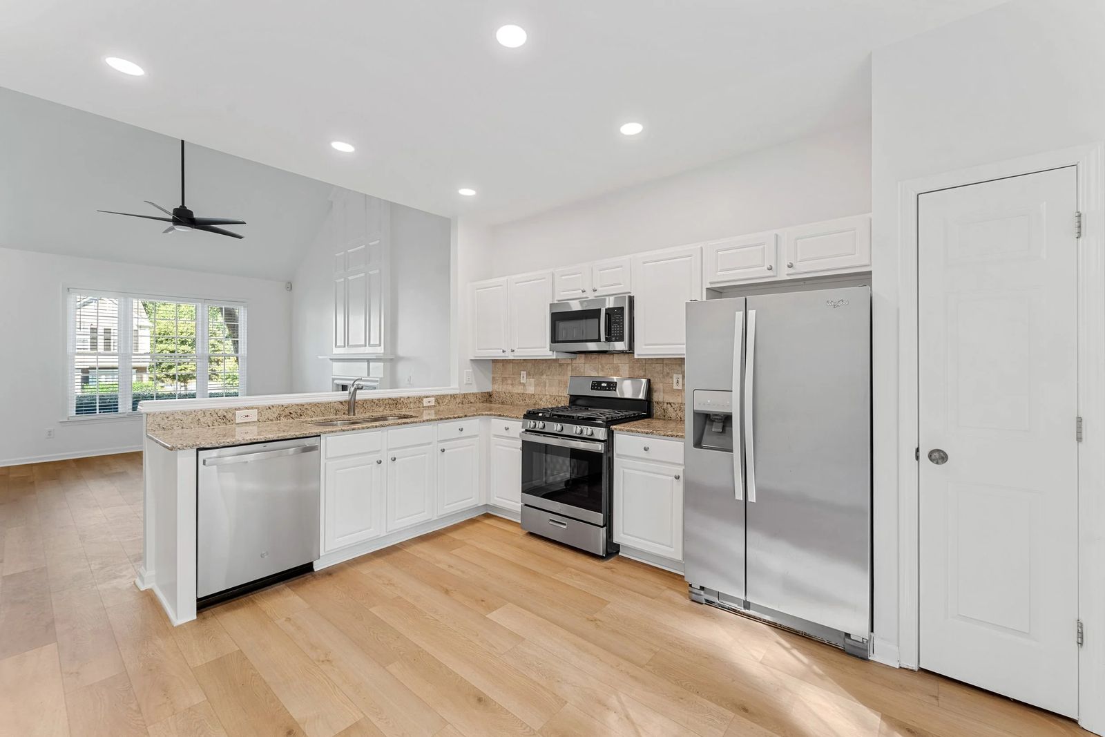 A clean, modern kitchen with stainless appliances