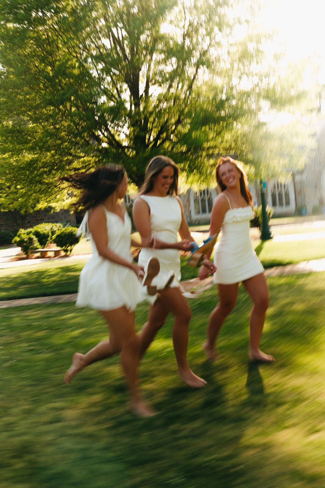 Friends laughing together in golden light
