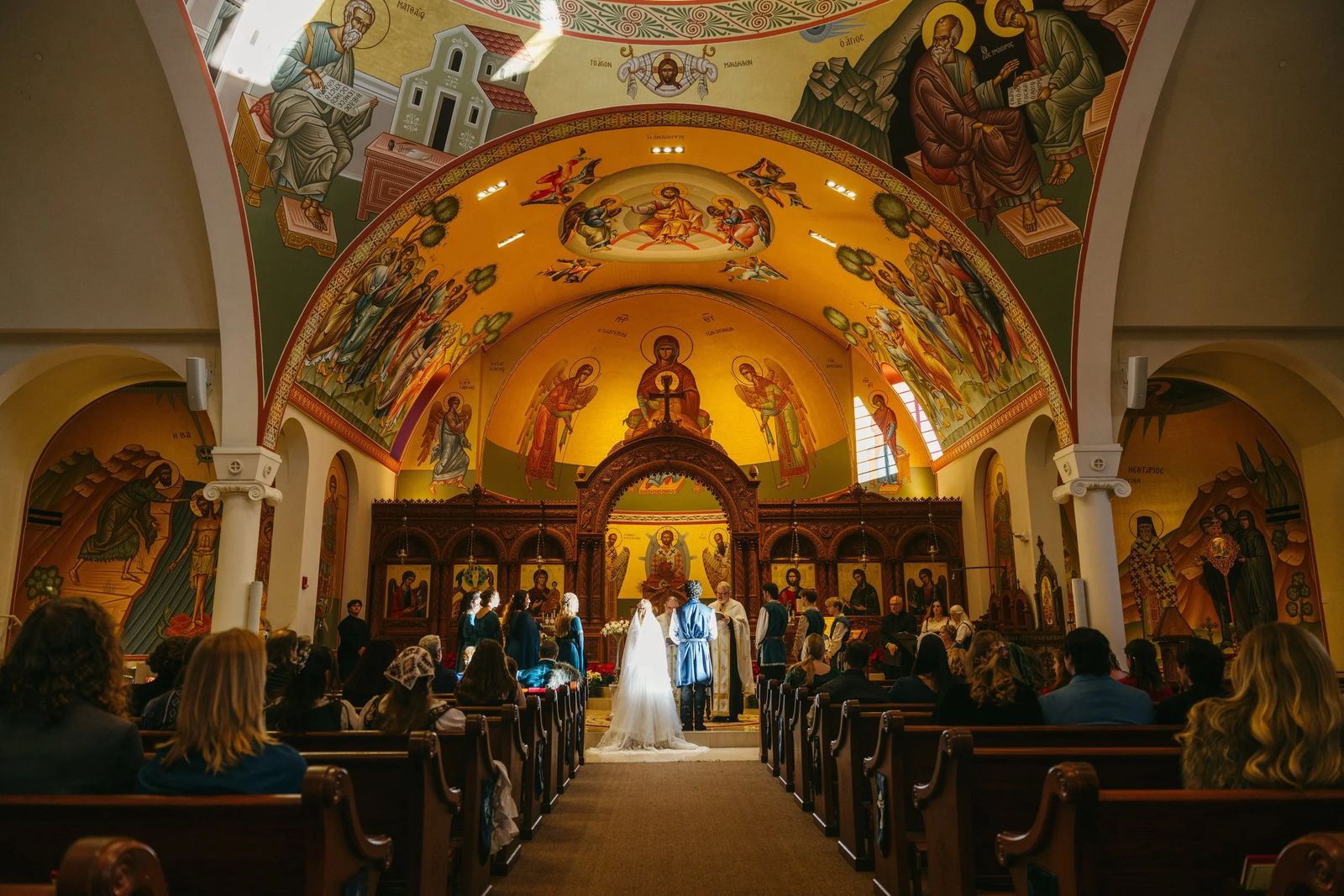 A wedding ceremony in a painted Orthodox church